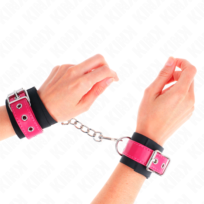 KINK - MUÑEQUERAS DE NYLON NEGRO CON CORREA POLIPIEL FUSCIA AJUSTABLE 19-29 CM X 5.1 CM - BDSM & BONDAGE - El Arte …